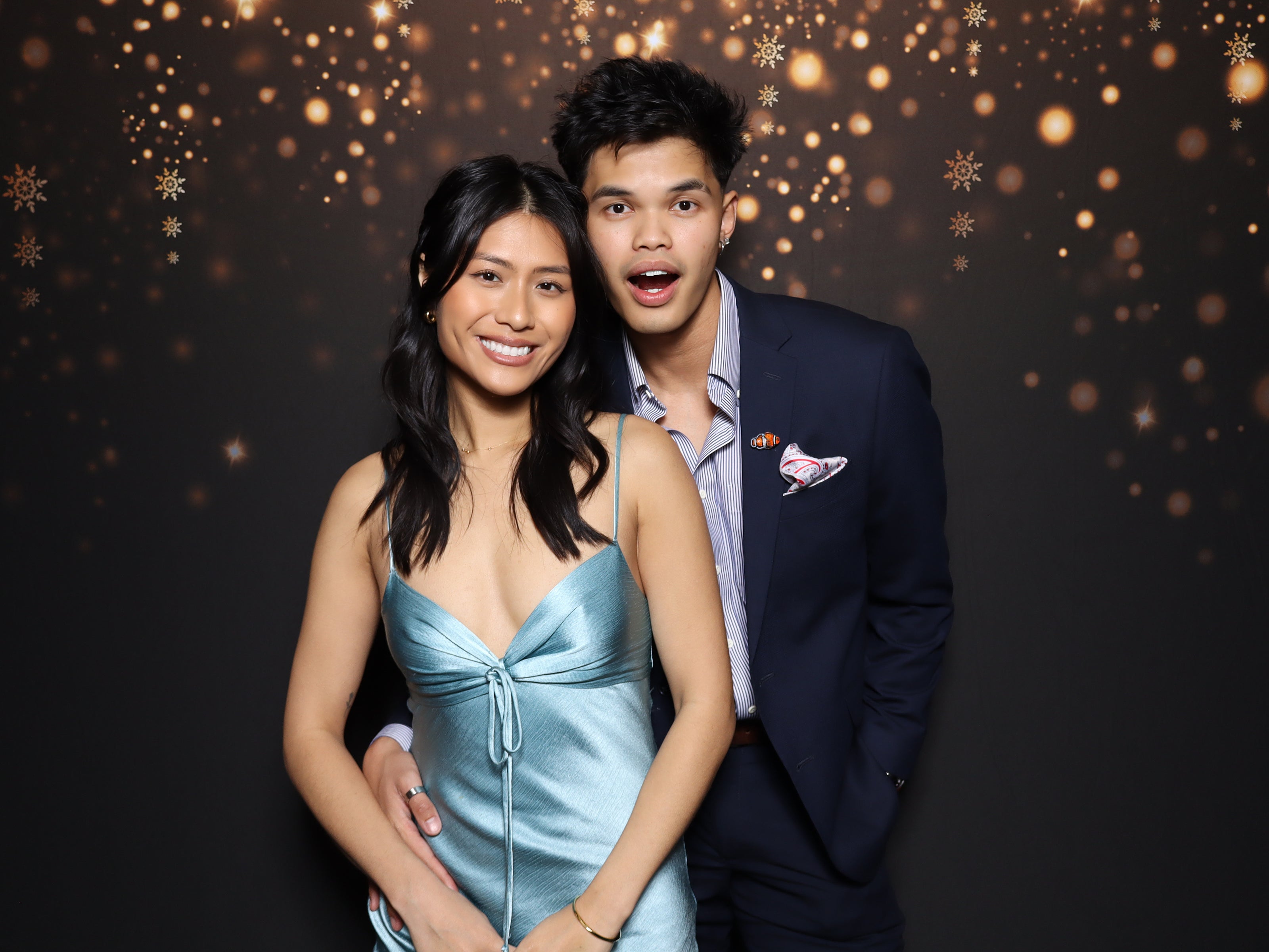 Guests celebrating with a wedding photo booth in Dallas
