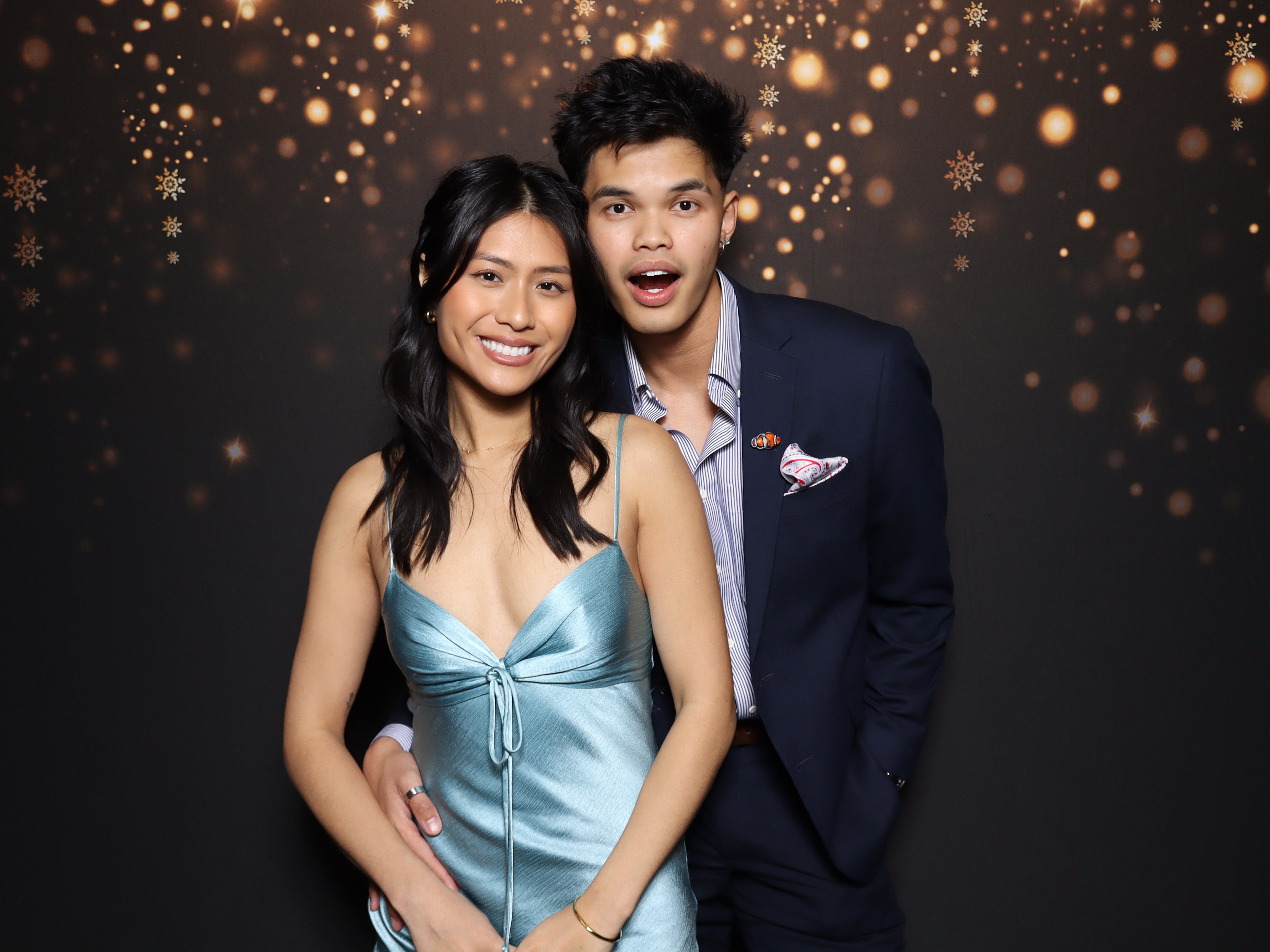 Guests celebrating with a wedding photo booth in Dallas
